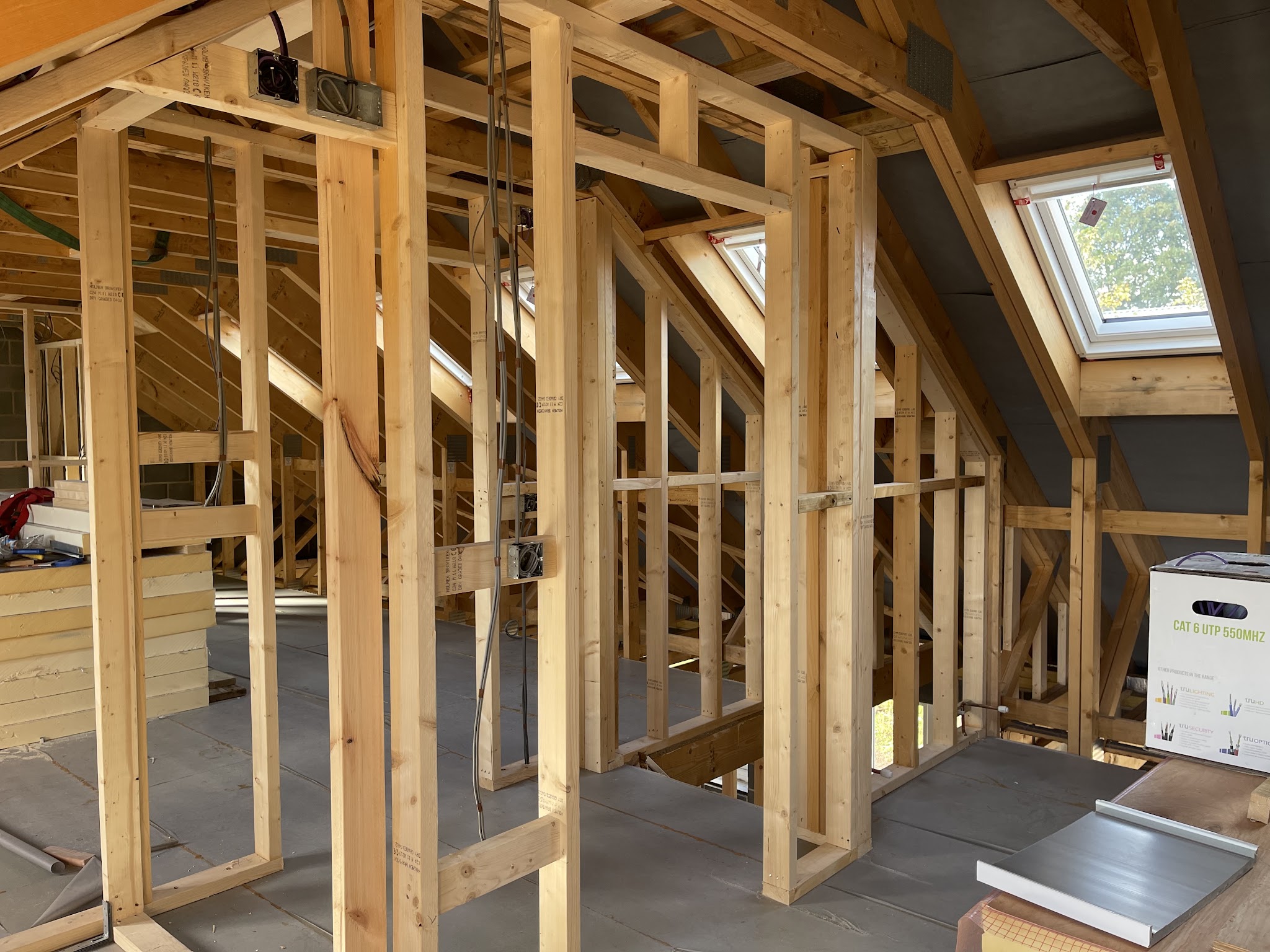 A timber stud loft conversion at first fix with cable runs
